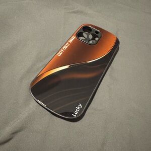 Lucky Sleek Black and Orange Case For a 15 Pro Max.